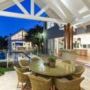 Plantation 8 Outdoor Dining Table with Coastal Wicker Chairs